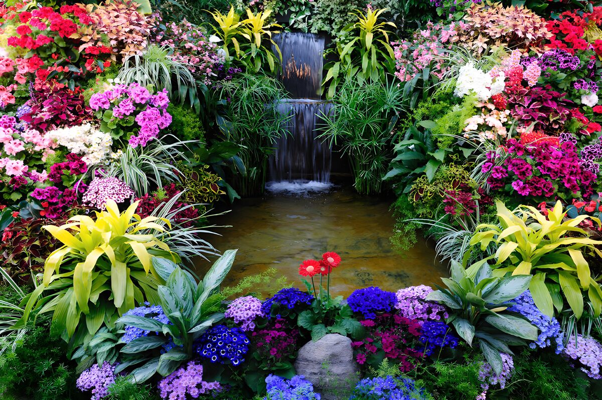 Vibrant Floral Oasis with Waterfall
