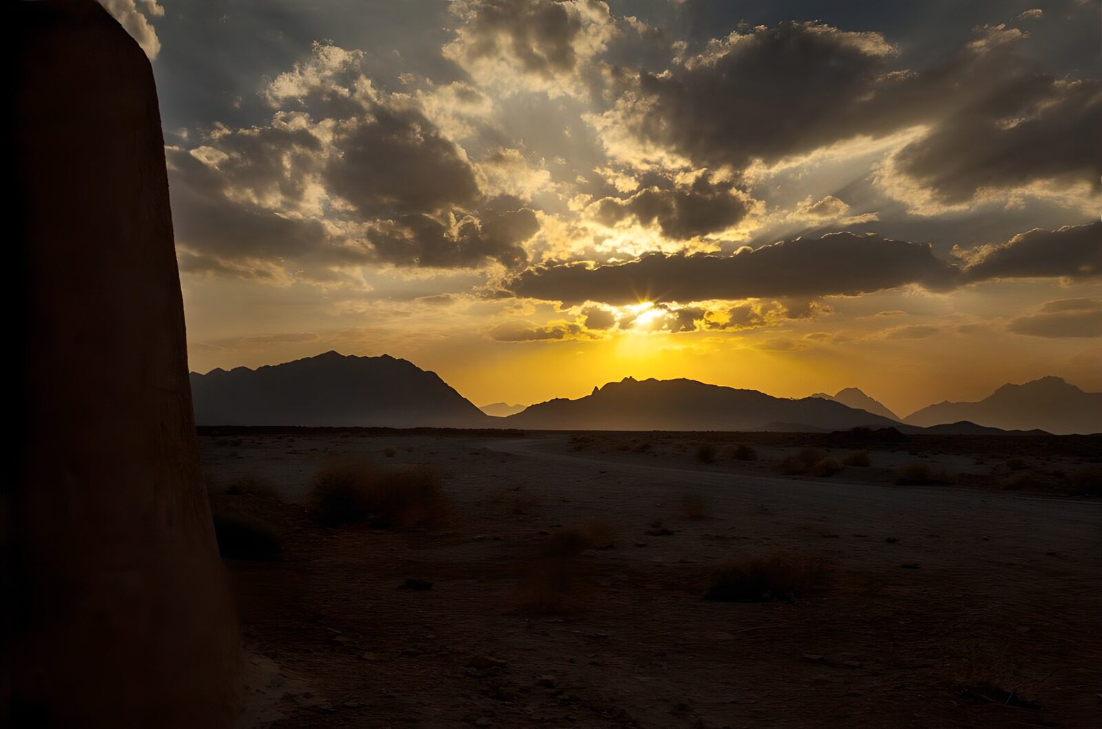 OCCOM2369358: Sunset Over Mountainous Landscape