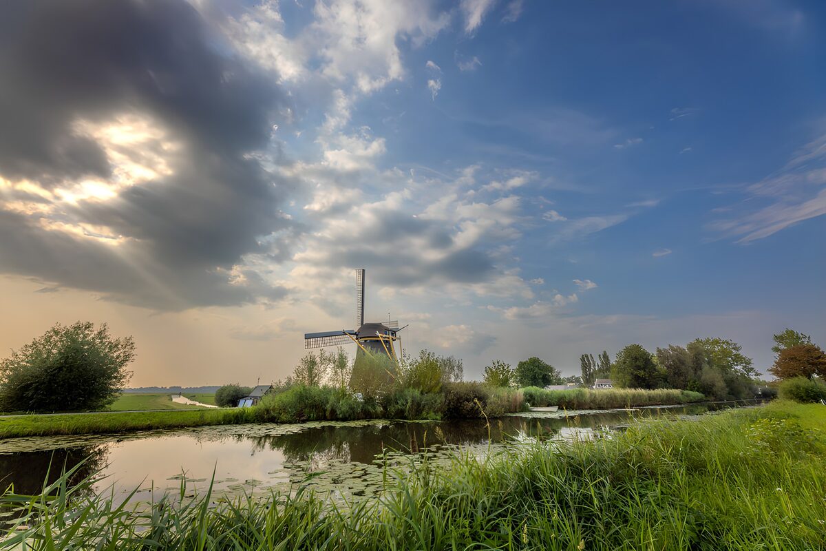 Scenic Dutch Windmill by the Water
