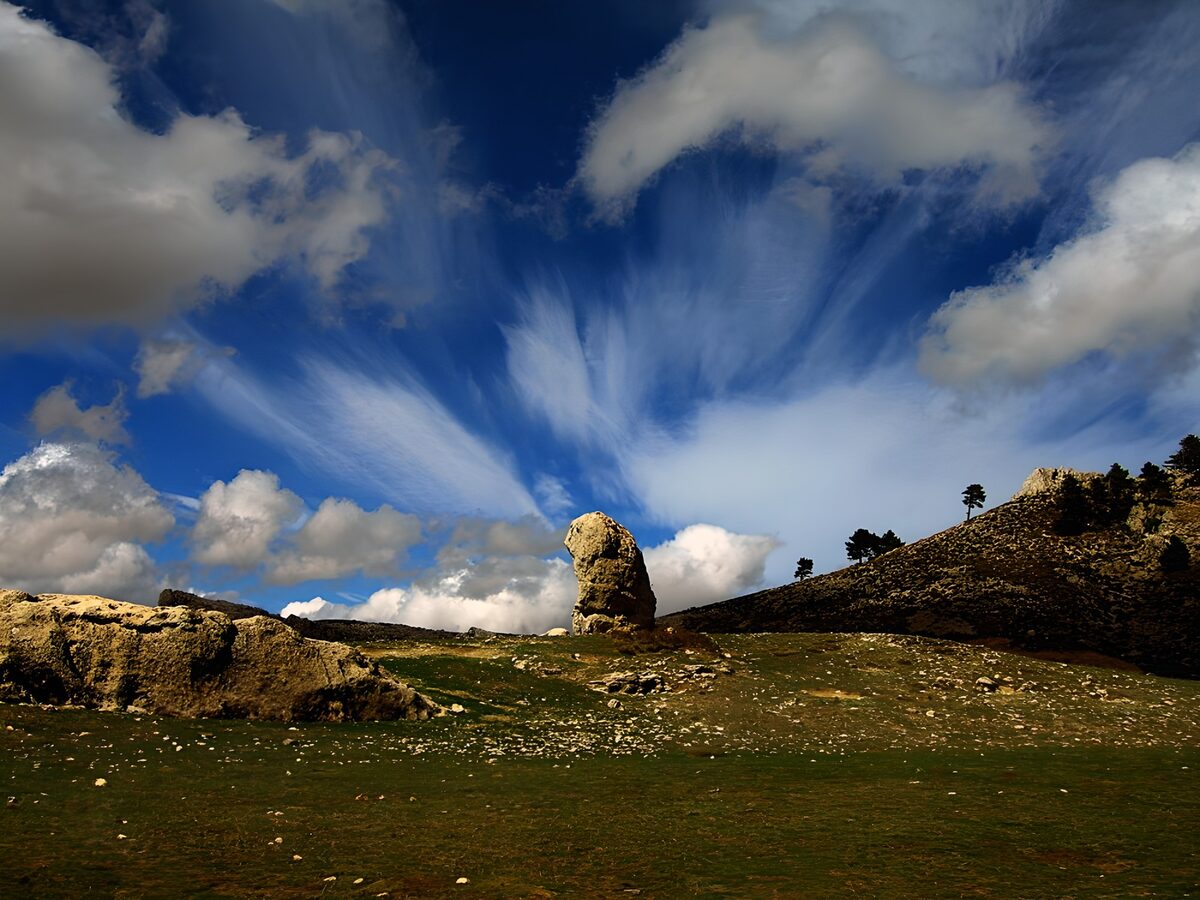 Majestic Rock Formation Under Blue Skies